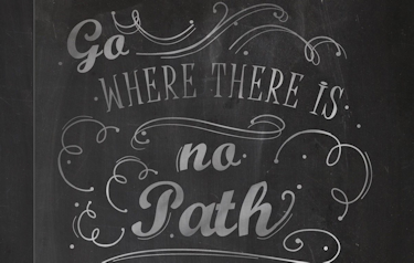 detail from smART bookx wwriting journal with the travel quote 'go where there is no path and leave a trail'